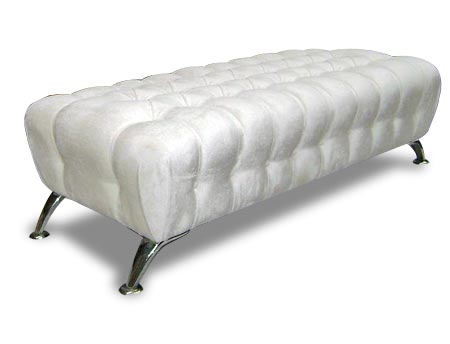 long skinny ottoman with deep buttons and white leather upholstery