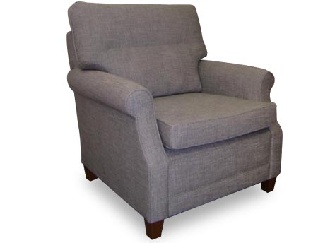 Oxford armchair grey upholstery and rounded arms. Exposed wooden legs.
